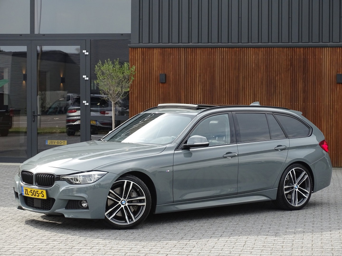 BMW 3 Serie Touring 340i 327PK M-sport / individual / Harman Kardon / ACC / Pano / Head-Up