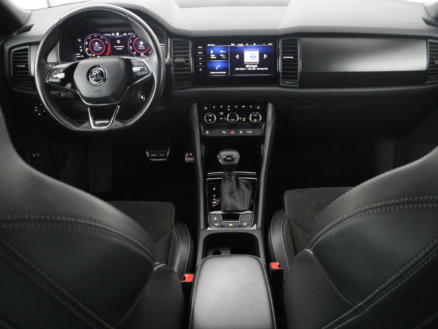 Škoda Kodiaq 1.5 TSI Sportline Business | Leder/alcantara | Memory | Cruise control | Stuur/stoel verwarming | Canton Sound | Carplay | Carplay | Camera | Park assist | Trekhaak | Elektrische achterklep