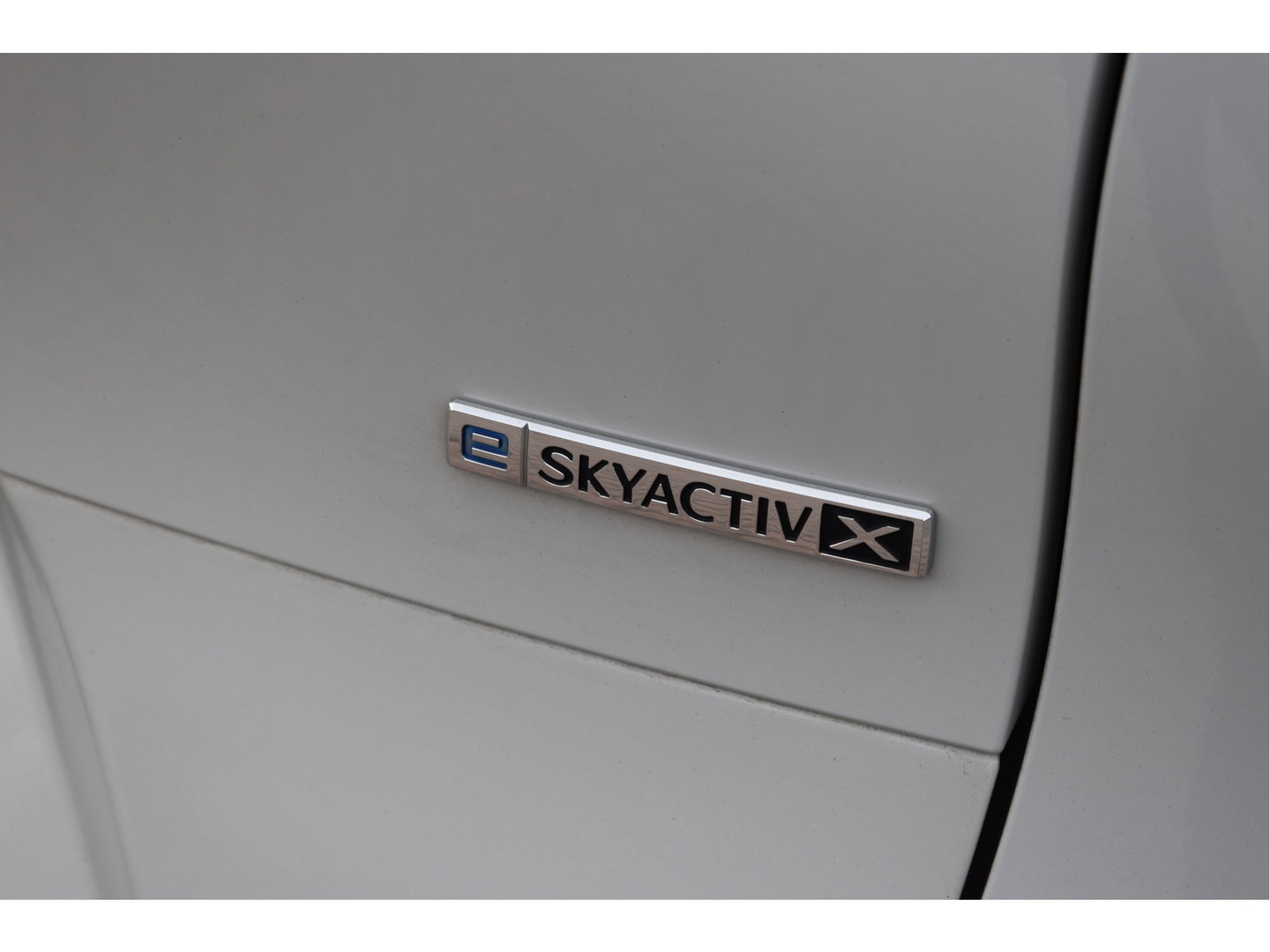 Mazda CX-30 2.0 e-SkyActiv-X M 186 pk Hybrid Exclusive-line | NL-Auto | HUD | Afn.trekhaak | Open dak | BOSE | 360 gr.camera | Keyless | Memorystoel | Full LED