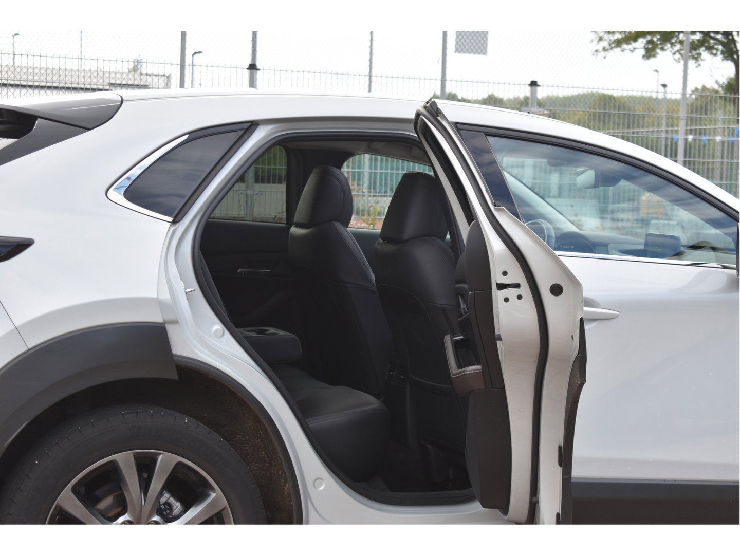 Mazda CX-30 2.0 e-SkyActiv-X M 186 pk Hybrid Exclusive-line | NL-Auto | HUD | Afn.trekhaak | Open dak | BOSE | 360 gr.camera | Keyless | Memorystoel | Full LED