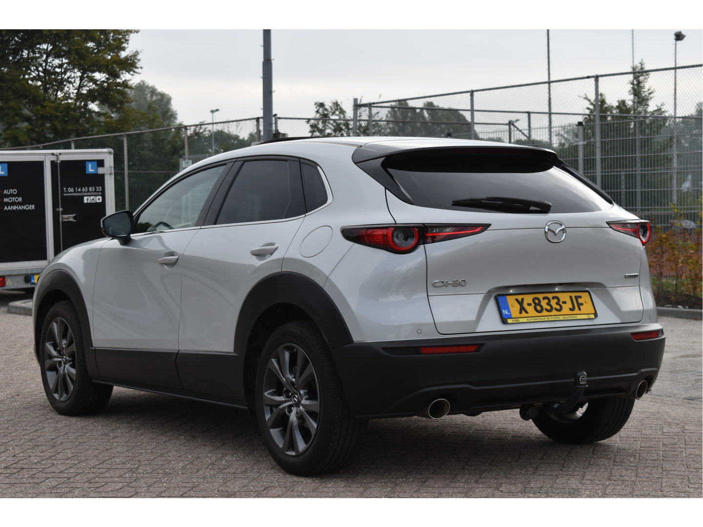 Mazda CX-30 2.0 e-SkyActiv-X M 186 pk Hybrid Exclusive-line | NL-Auto | HUD | Afn.trekhaak | Open dak | BOSE | 360 gr.camera | Keyless | Memorystoel | Full LED