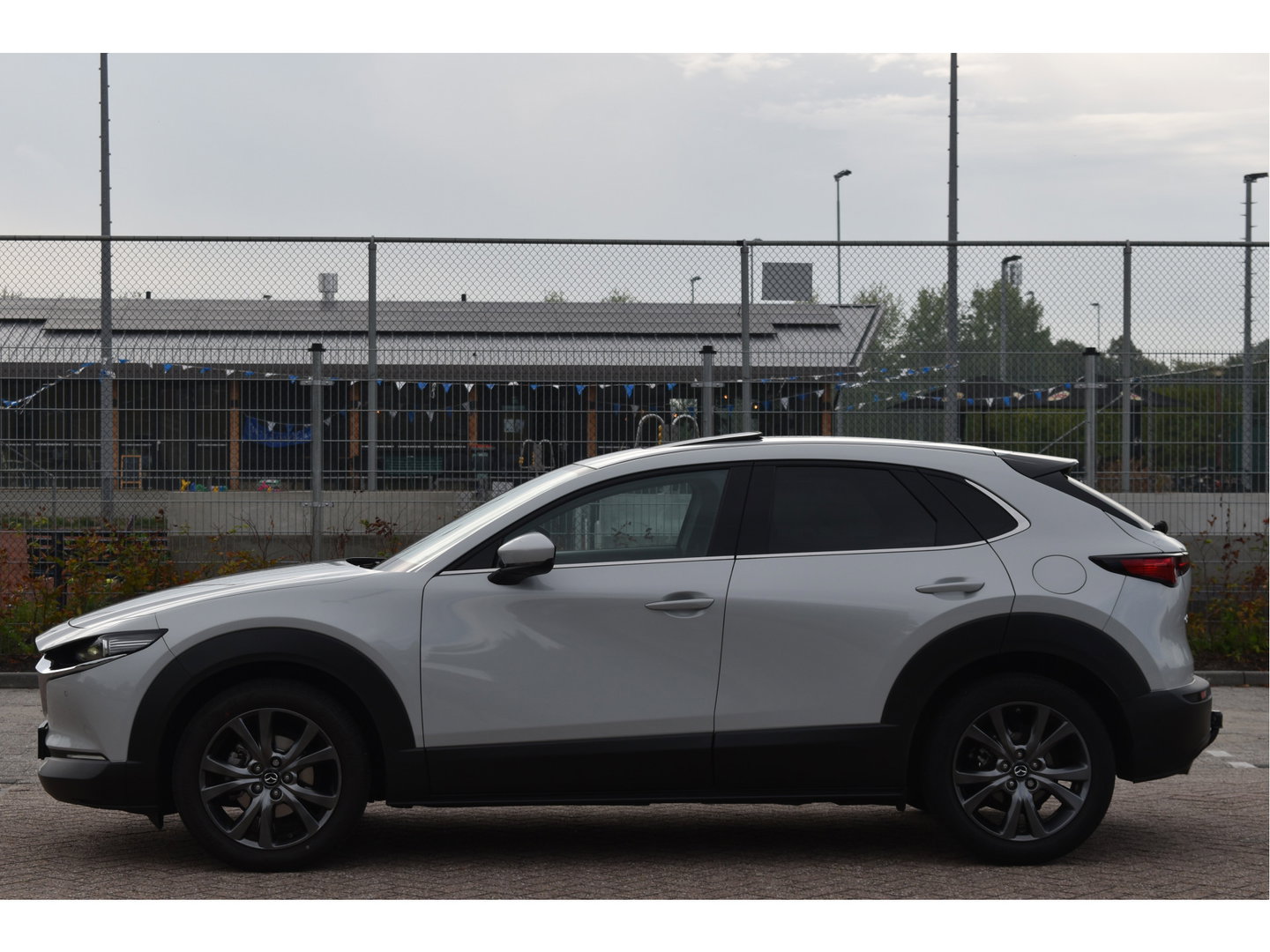 Mazda CX-30 2.0 e-SkyActiv-X M 186 pk Hybrid Exclusive-line | NL-Auto | HUD | Afn.trekhaak | Open dak | BOSE | 360 gr.camera | Keyless | Memorystoel | Full LED