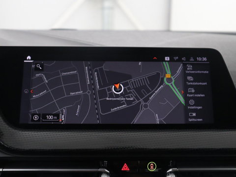 BMW 1-serie 118i Business Edition | Half leder | Cruise control | Stoelverwarming | Navigatie | Carplay | Park assist | Climate control | Virtual dashboard | 17" velgen