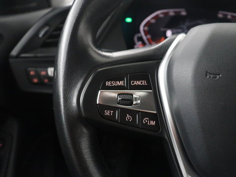 BMW 1-serie 118i Business Edition | Half leder | Cruise control | Stoelverwarming | Navigatie | Carplay | Park assist | Climate control | Virtual dashboard | 17" velgen