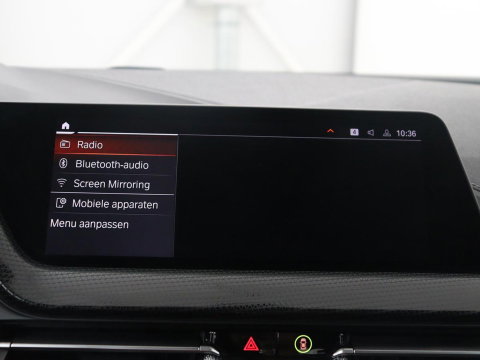 BMW 1-serie 118i Business Edition | Half leder | Cruise control | Stoelverwarming | Navigatie | Carplay | Park assist | Climate control | Virtual dashboard | 17" velgen