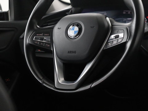 BMW 1-serie 118i Business Edition | Half leder | Cruise control | Stoelverwarming | Navigatie | Carplay | Park assist | Climate control | Virtual dashboard | 17" velgen
