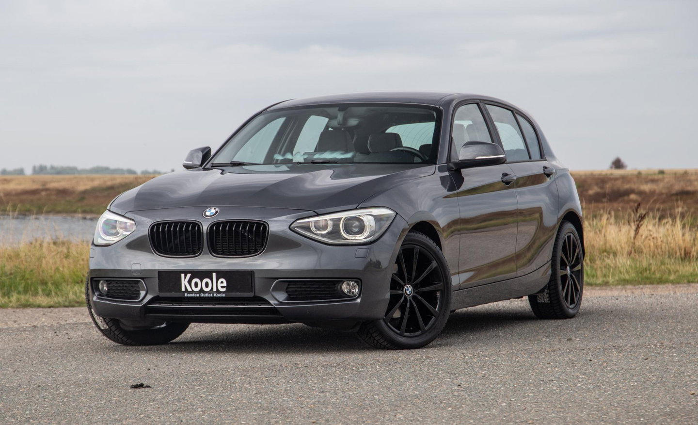 BMW 1 Serie 116i Business+ AUTOMAAT / CRUISE CONTROLE / BLACK LINE / AIRCO / CARPLAY / URBAN