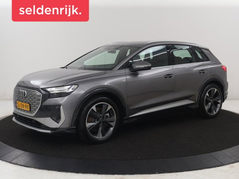 Audi Q4 e-Tron 40 77KWH 150 KW S-Line | SOH 96,3% | Half leder | Adaptive cruise | Stoelverwarming | Drive select | Navigatie | Carplay | Sfeerverlichting | Camera | Park assist | Elektrische achterklep