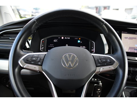 Volkswagen Transporter 2.0 TDI L2H1 32 DC Caravelle Virtual, Adaptieve Cruise, Carplay, LED, Leder, 2 x Electrische deur, Automaat, Clima, Stoelverwarming, Uniek! Bulli / Highline