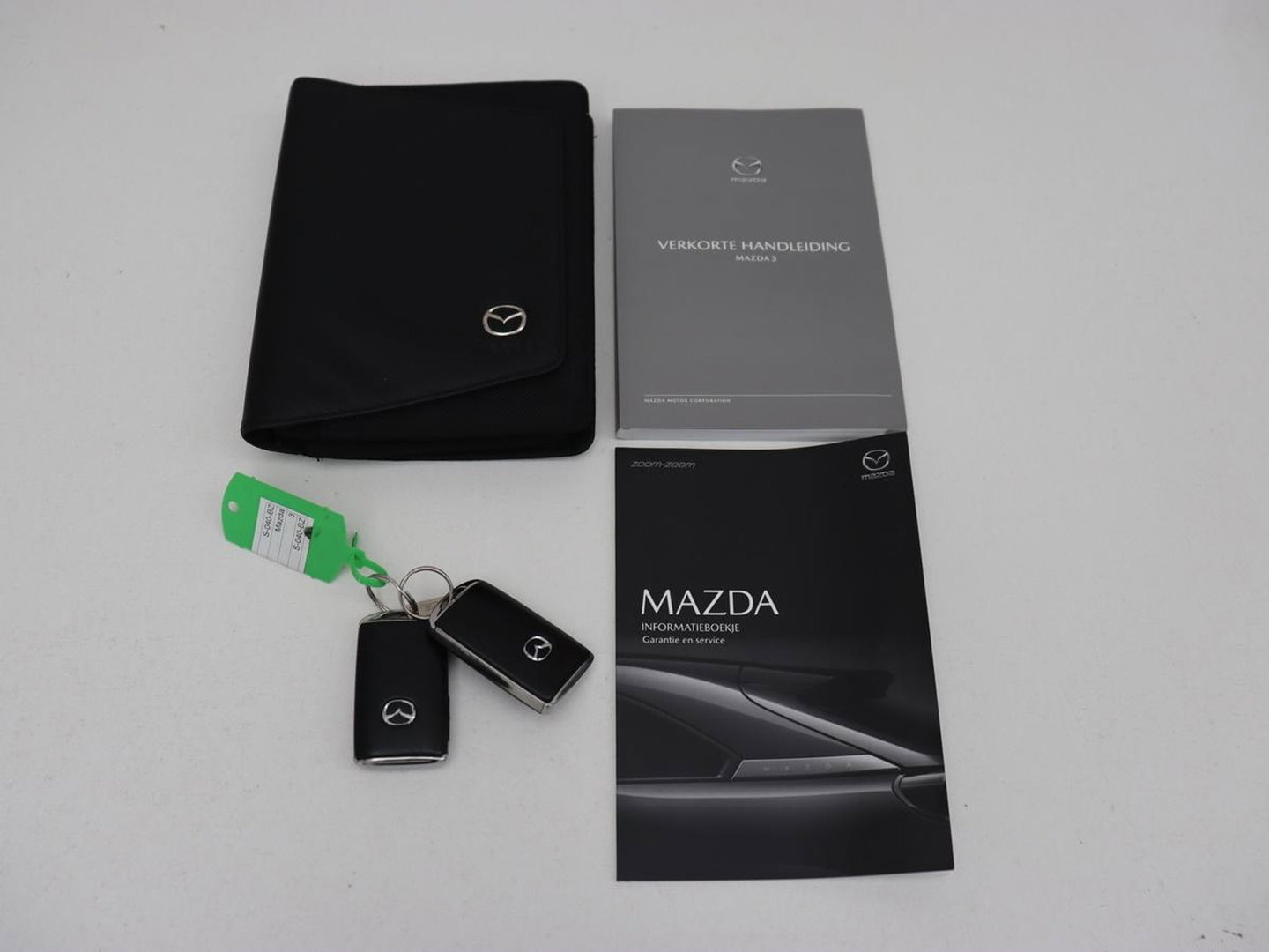 Mazda 3 2.0 e-SkyActiv-G M Hybrid 150 Homura | Stoelverw. Stoelverwarming | Head-Up | Adaptive cruise | Camera | Carplay | Keyless | Full LED | Navigatie | Dodehoek detectie | 58.800km NAP | Origineel NL