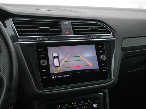 Volkswagen Tiguan 1.4 TSI eHybrid R-Line Business+ (Plug-in) (INCL-BTW) Aut. *LEATHER-FABRIC | FULL-LED | ADAPTIVE-CRUISE | CAMERA | DIGI-COCKPIT | KEYLESS | PRIVACY-GLASS | SPORTSEATS | SHIFTPADDLES | NAVI-FULLMAP | ECC | PDC | 19''ALU*
