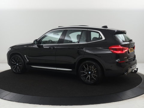 BMW X3 xDrive20i | Trekhaak | Panoramadak | Adaptive cruise | Half Leder | Head-up | Camera | Sfeerverlichting | Climate control | Stoelverwarming | Full LED |