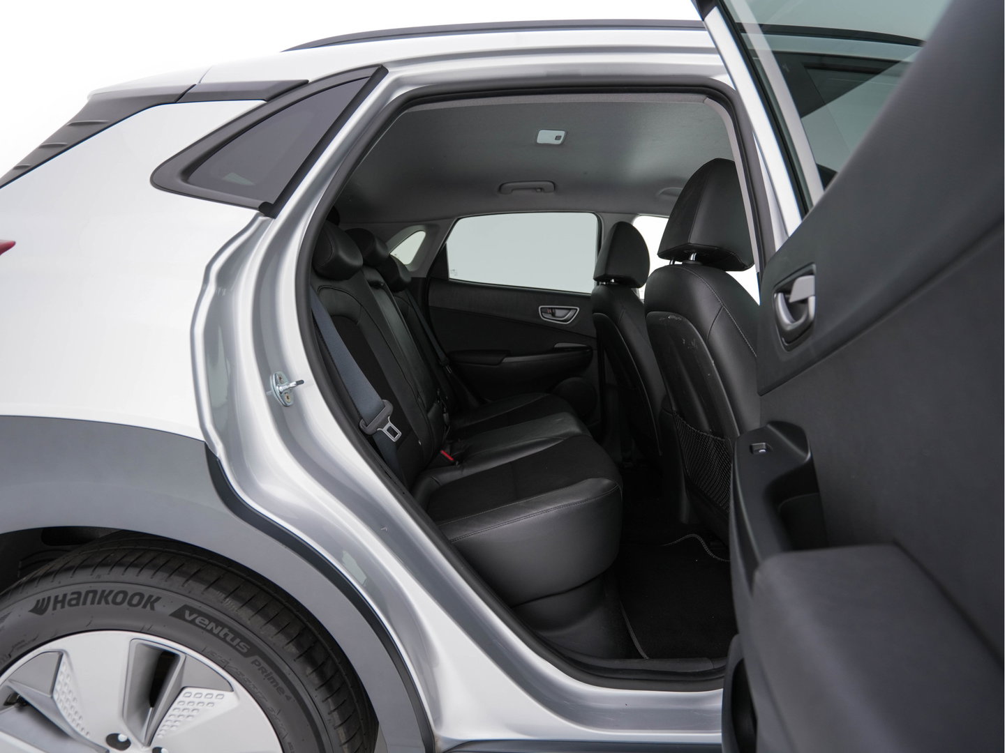 Hyundai KONA EV Fashion 64 kWh (3-Fase) {SOH-100%} (INCL-BTW)  Aut * HEATPUMP | NAVI-FULLMAP | LEATHER-FABRIC | KEYLESS | CAMERA | DAB | ECC | ADAPTIVE-CRUISE | LANE-ASSIST | HEATED-SEATS | PRIVACY-GLASS | HEAD-UP | SHIFTPADDLES | 17"ALU*
