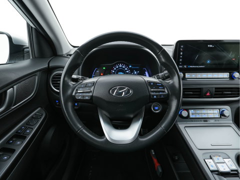 Hyundai KONA EV Fashion 64 kWh (3-Fase) {SOH-100%} (INCL-BTW)  Aut * HEATPUMP | NAVI-FULLMAP | LEATHER-FABRIC | KEYLESS | CAMERA | DAB | ECC | PDC | ADAPTIVE-CRUISE | LANE-ASSIST | HEATED SEATS | PRIVACY-GLASS | HEAD-UP | SHIFT-PADDLES | 17"A