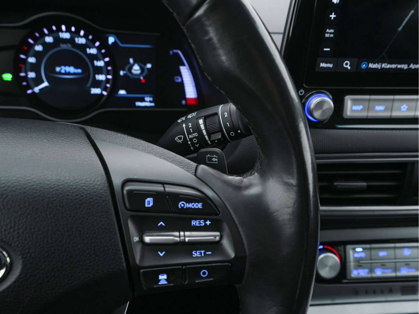 Hyundai KONA EV Fashion 64 kWh (3-Fase) {SOH-100%} (INCL-BTW)  Aut * HEATPUMP | NAVI-FULLMAP | LEATHER-FABRIC | KEYLESS | CAMERA | DAB | ECC | ADAPTIVE-CRUISE | LANE-ASSIST | HEATED-SEATS | PRIVACY-GLASS | HEAD-UP | SHIFTPADDLES | 17"ALU*