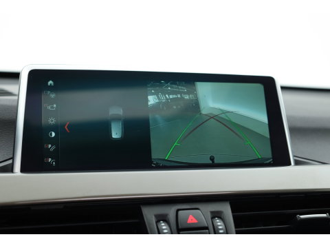 BMW X1 sDrive20i Orange Edition II | Rijklaar! | Navi | Cruise | Pano | Trekhaak | Stoelverw. | HUD | PDVC V+A | 18"
