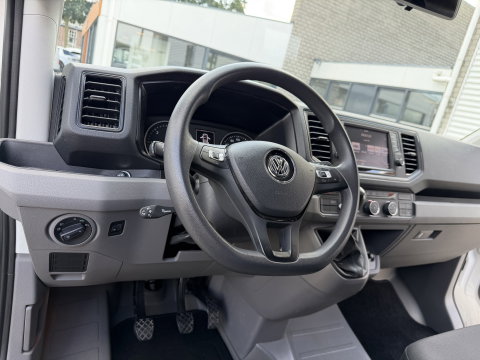 Volkswagen Crafter 35 2.0 TDI 177pk L3H3 ( L2H2 ) Comfortline / vaste prijs rijklaar € 23.950 ex btw / euro 6 / lease vanaf € 391 / dubbele schuifdeur / ramen rondom / airco / cruise / navi / camera !