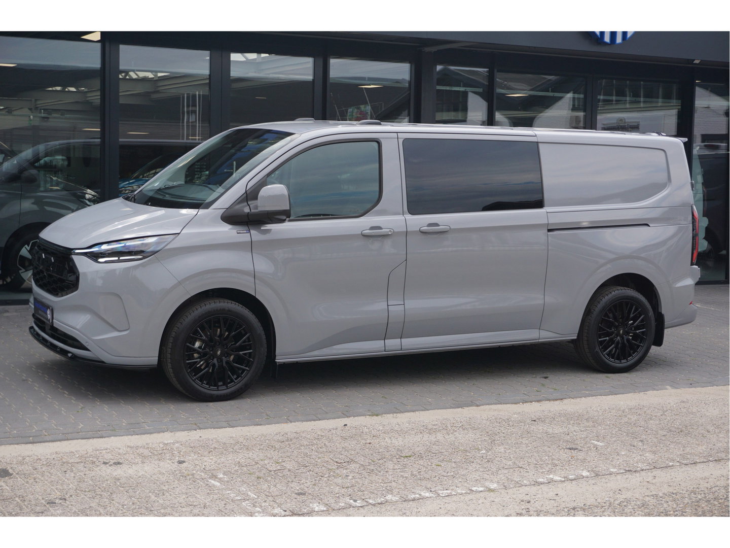 Ford Transit Custom 340L JWR Edition DC Elektrisch 71 kWh / 218 PK Navi, Camera, 19" LM, ACC, Matrix LED!! NR. 600