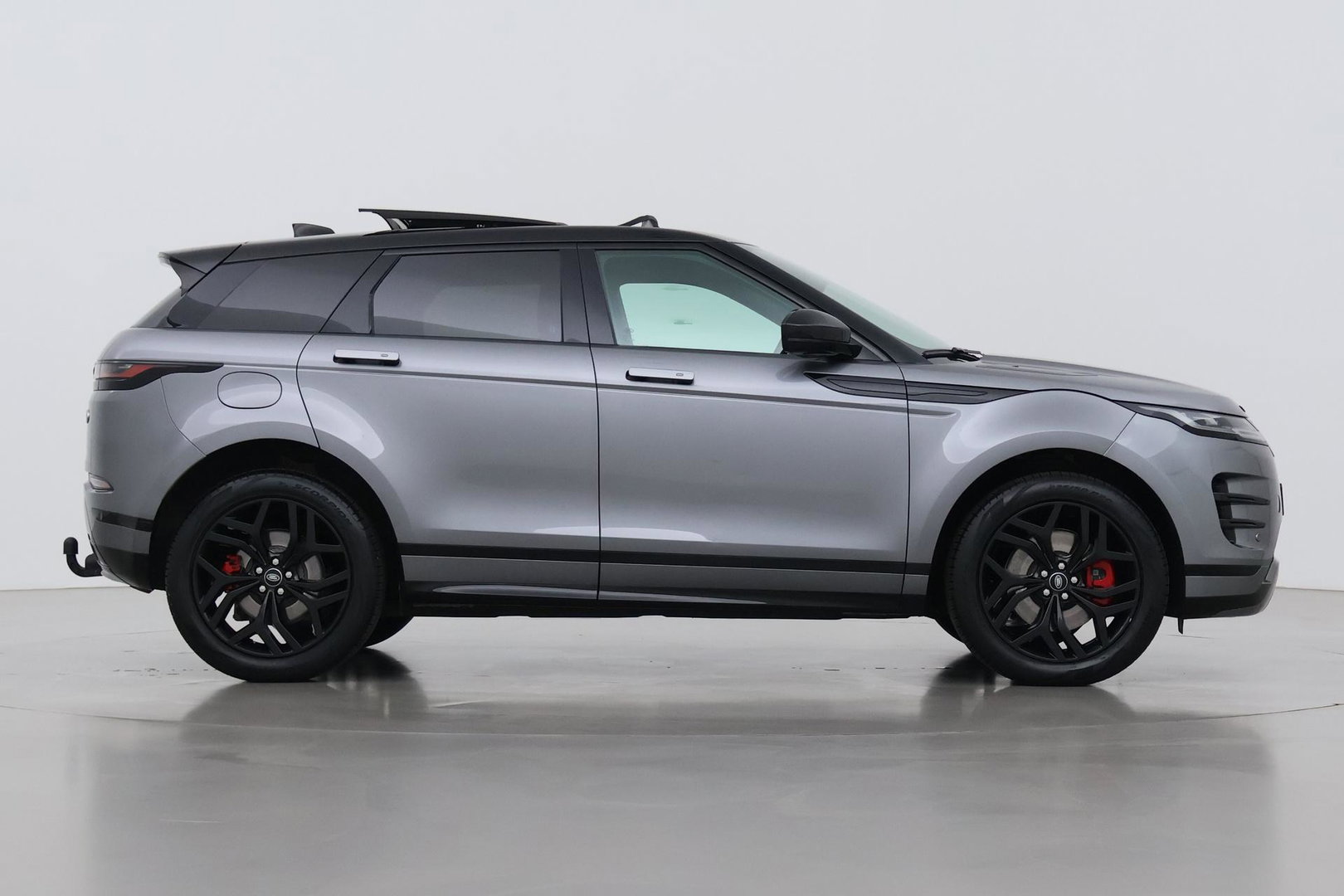 Land Rover Range Rover Evoque 1.5 P300e AWD R-Dynamic SE | Panoramadak | Trekhaak | Stuurverwarming | Meridian
