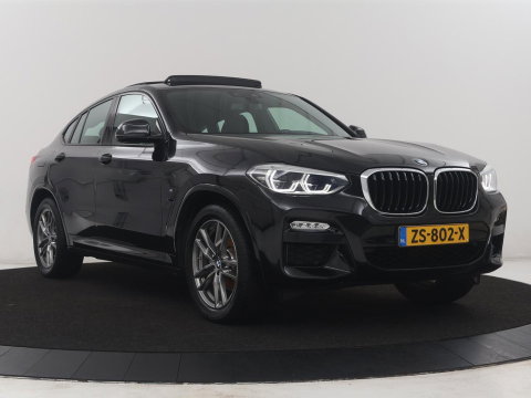 BMW X4 xDrive20i High Executive Edition M-sport | Panoramadak | Leder | Trekhaak | Camera | Sfeerverlichting | Stoelverwarming | Full LED | Climate control | Park assist | Cruise control |