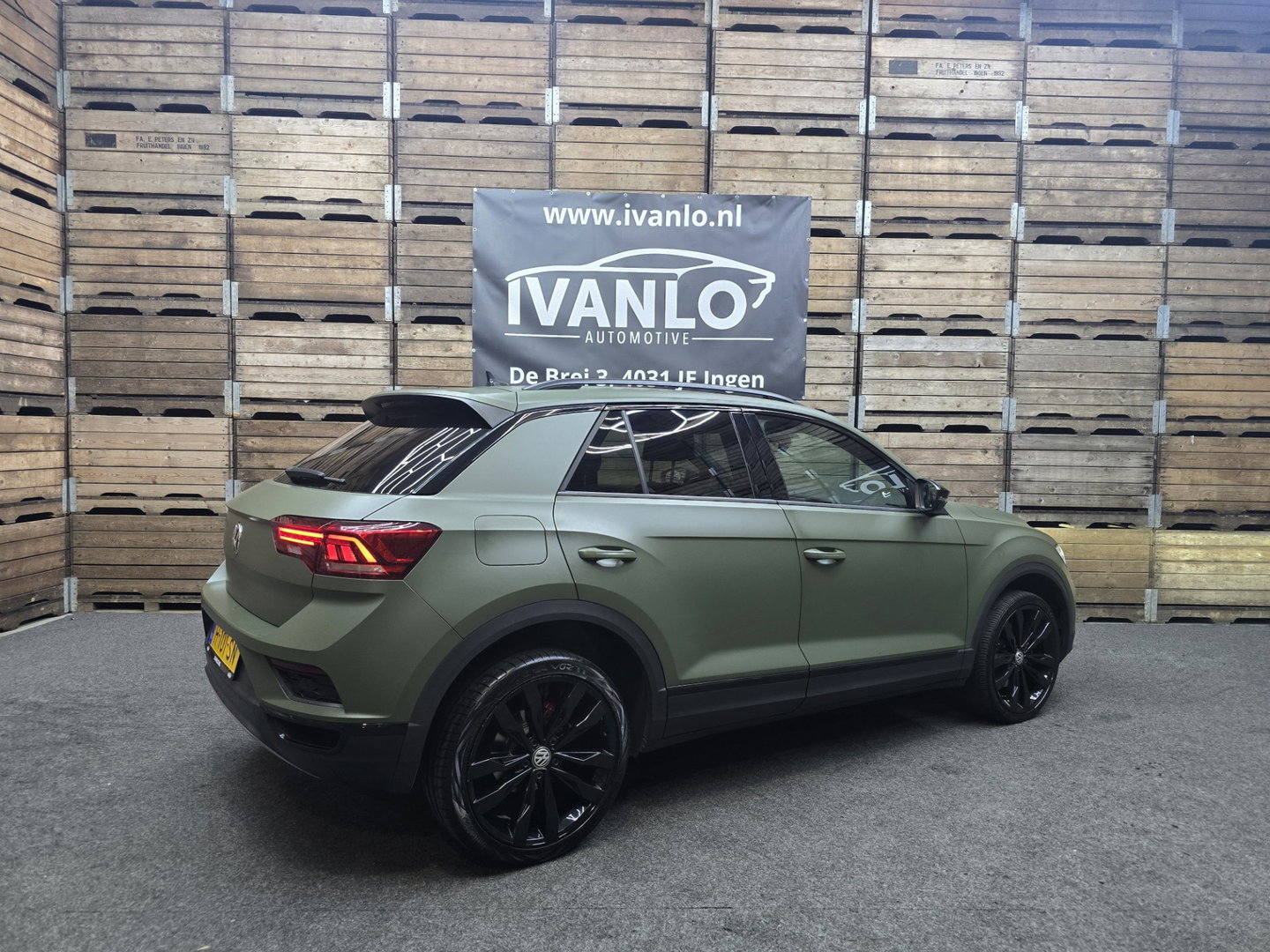 Volkswagen T-Roc 1.5 TSI Sport Navi VCP Clima Cruise Camera 19"LM Darkgreen Wrap 200PK!