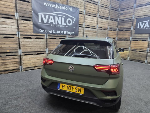 Volkswagen T-Roc 1.5 TSI Sport Navi VCP Clima Cruise Camera 19"LM Darkgreen Wrap 200PK!