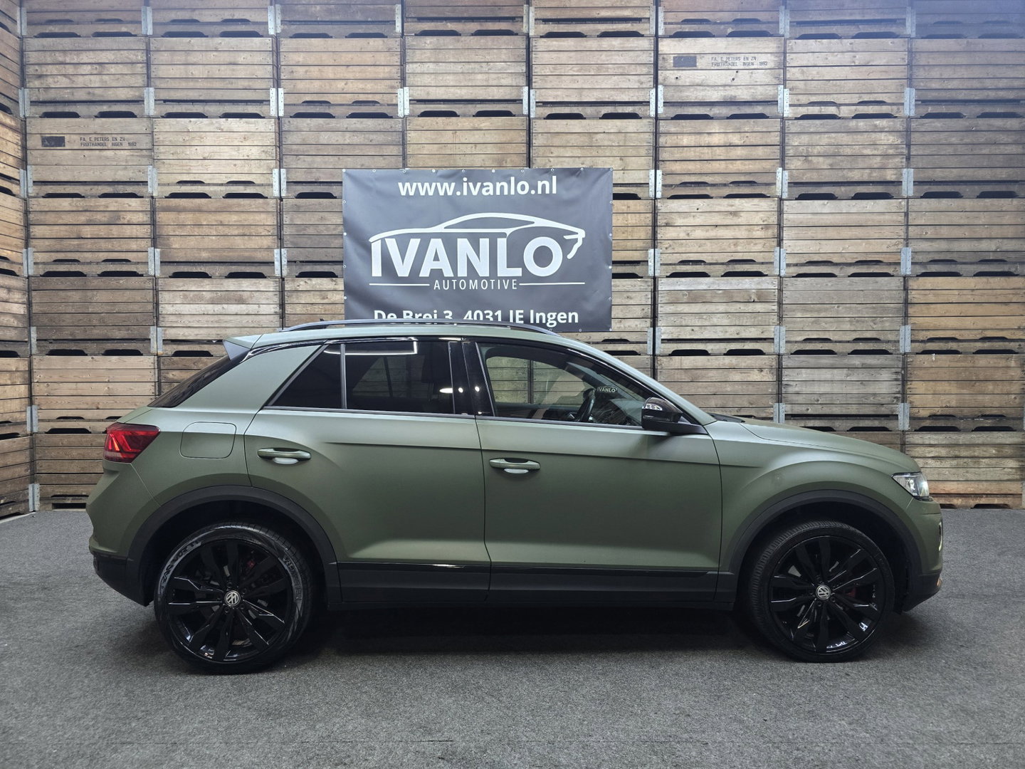 Volkswagen T-Roc 1.5 TSI Sport Navi VCP Clima Cruise Camera 19"LM Darkgreen Wrap 200PK!