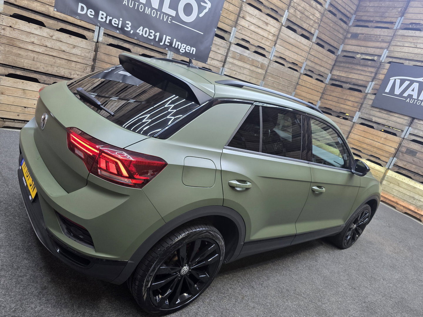 Volkswagen T-Roc 1.5 TSI Sport Navi VCP Clima Cruise Camera 19"LM Darkgreen Wrap 200PK!