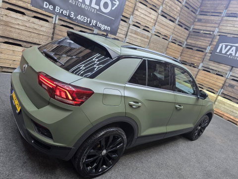 Volkswagen T-Roc 1.5 TSI Sport Navi VCP Clima Cruise Camera 19"LM Darkgreen Wrap 200PK!