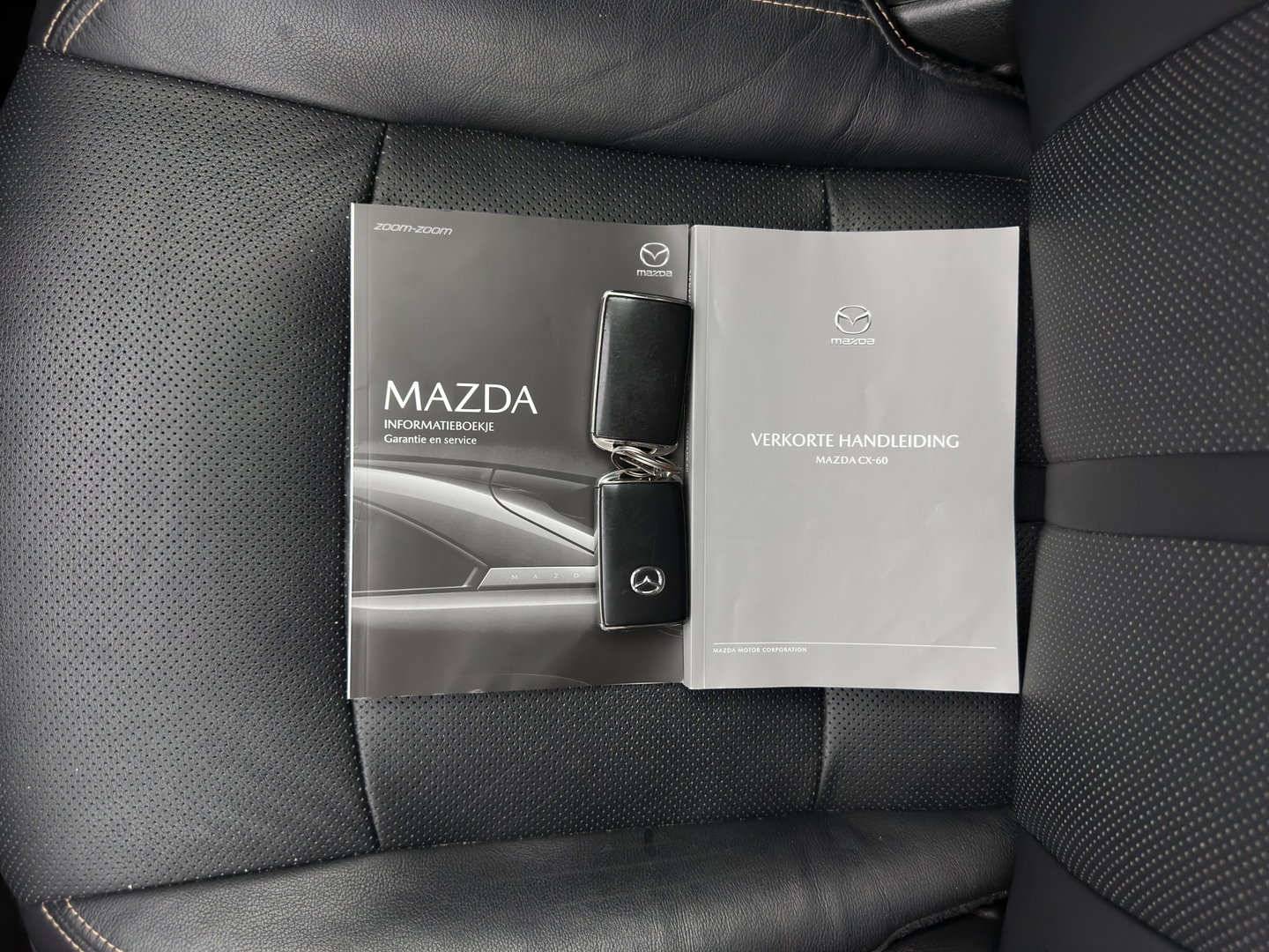 Mazda CX-60 2.5 e-SkyActiv PHEV Exclusive-Line [3-Fase] (Plug-in) (INCL.BTW) Aut. *LEATHER | HEAD-UP | FULL-LED | BLINDSPOT | HEATED/COOLD-COMFORTSEATS | MEMORY-PACK | DIGI-COCKPIT | KEYLESS | DAB | NAVI-FULLMAP | CAMERA | CARPLAY | SHIFTPADDLES*
