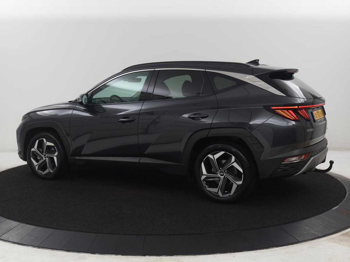 Hyundai Tucson 1.6 T-GDI HEV Premium | Leder | Stoelkoeling | Trekhaak | 360 camera | Adaptive cruise | Carplay | Krell Sound | Memory | Stuur/stoelverwarming |