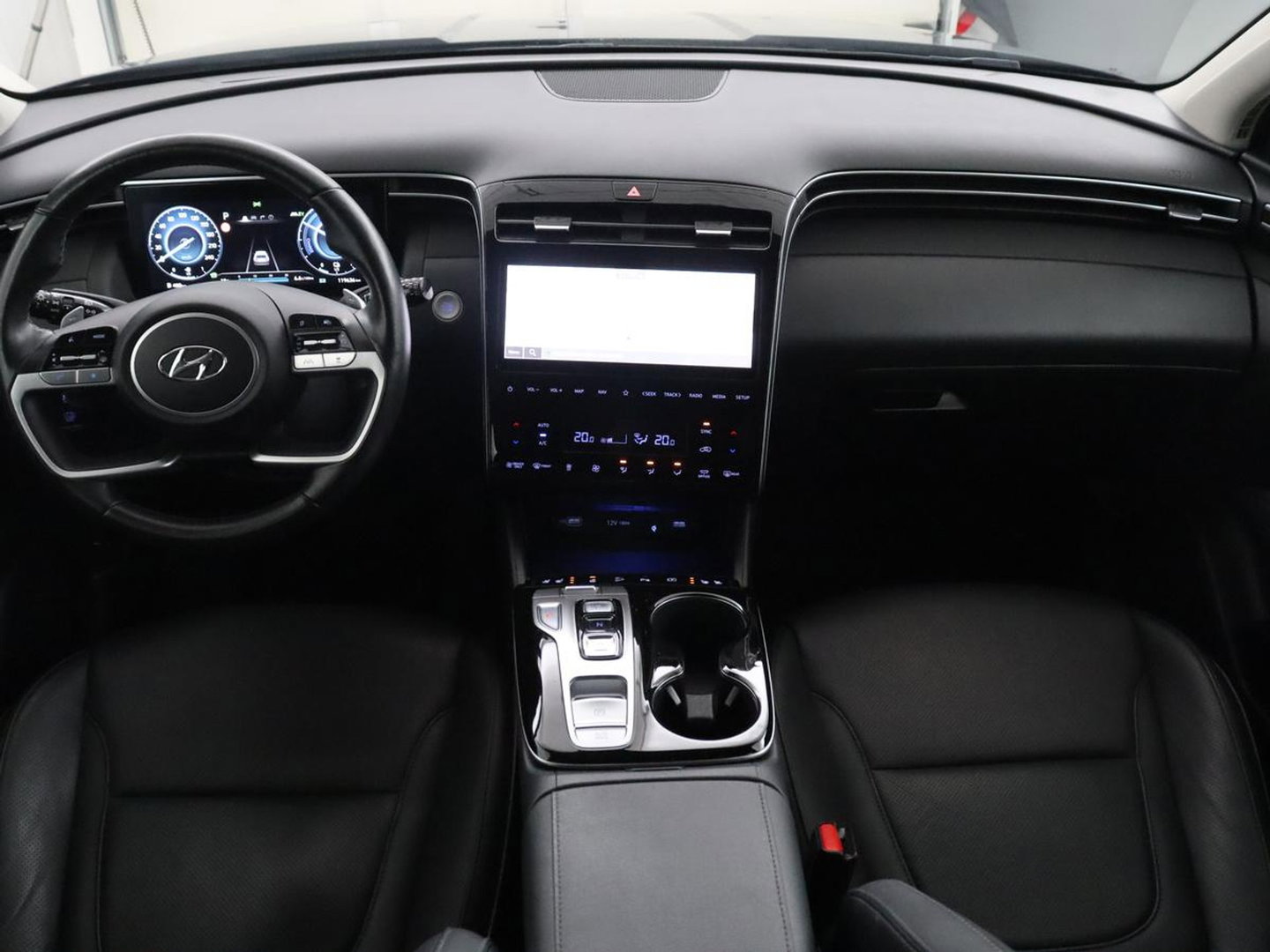 Hyundai Tucson 1.6 T-GDI HEV Premium | Leder | Stoelkoeling | Trekhaak | 360 camera | Adaptive cruise | Carplay | Krell Sound | Memory | Stuur/stoelverwarming |