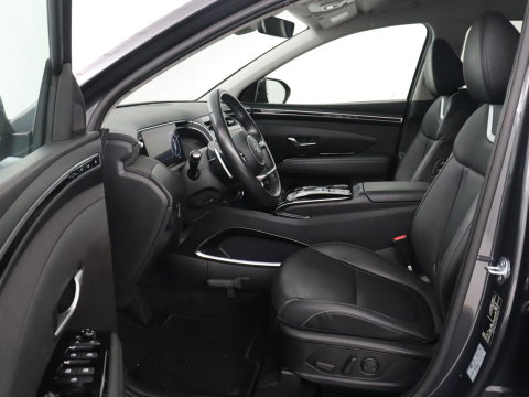 Hyundai Tucson 1.6 T-GDI HEV Premium | Leder | Stoelkoeling | Trekhaak | 360 camera | Adaptive cruise | Carplay | Krell Sound | Memory | Stuur/stoelverwarming |