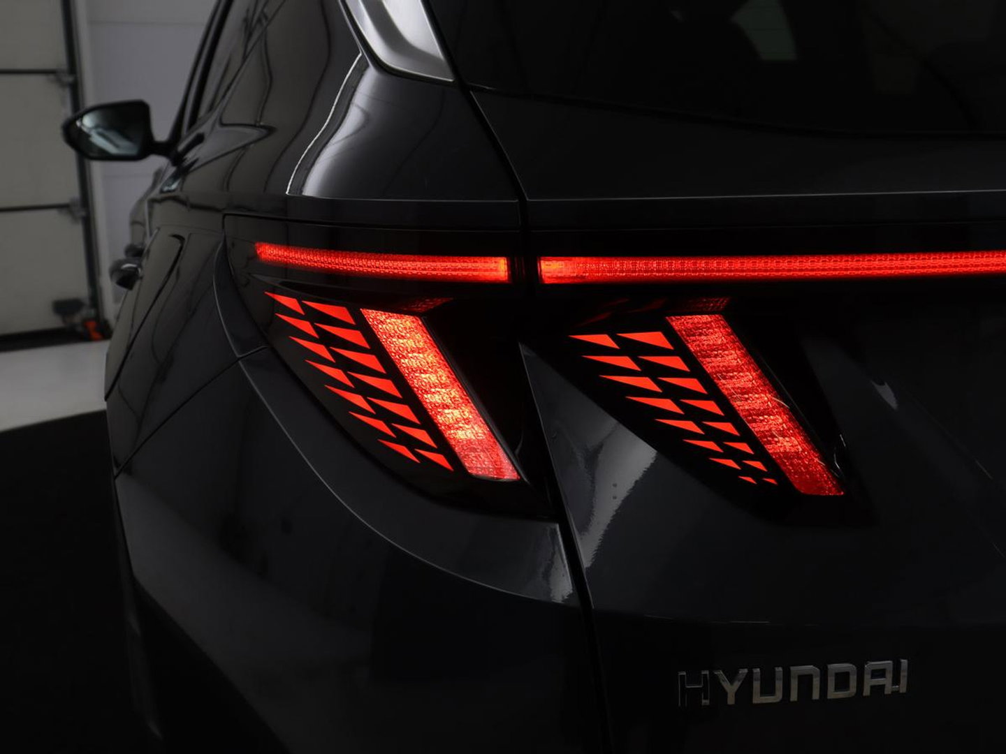 Hyundai Tucson 1.6 T-GDI HEV Premium | Leder | Stoelkoeling | Trekhaak | 360 camera | Adaptive cruise | Carplay | Krell Sound | Memory | Stuur/stoelverwarming |