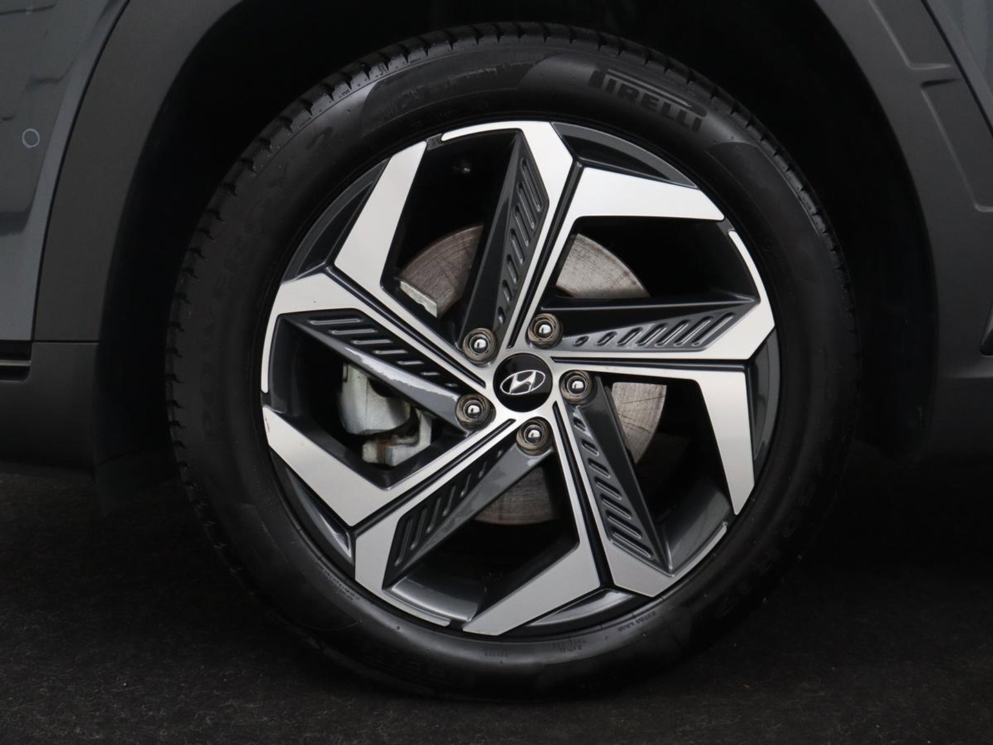 Hyundai Tucson 1.6 T-GDI HEV Premium | Leder | Stoelkoeling | Trekhaak | 360 camera | Adaptive cruise | Carplay | Krell Sound | Memory | Stuur/stoelverwarming |