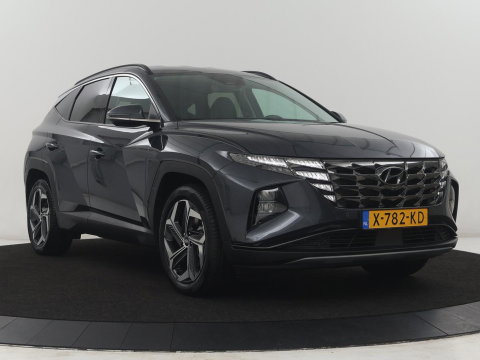 Hyundai Tucson 1.6 T-GDI HEV Premium | Leder | Stoelkoeling | Trekhaak | 360 camera | Adaptive cruise | Carplay | Krell Sound | Memory | Stuur/stoelverwarming |