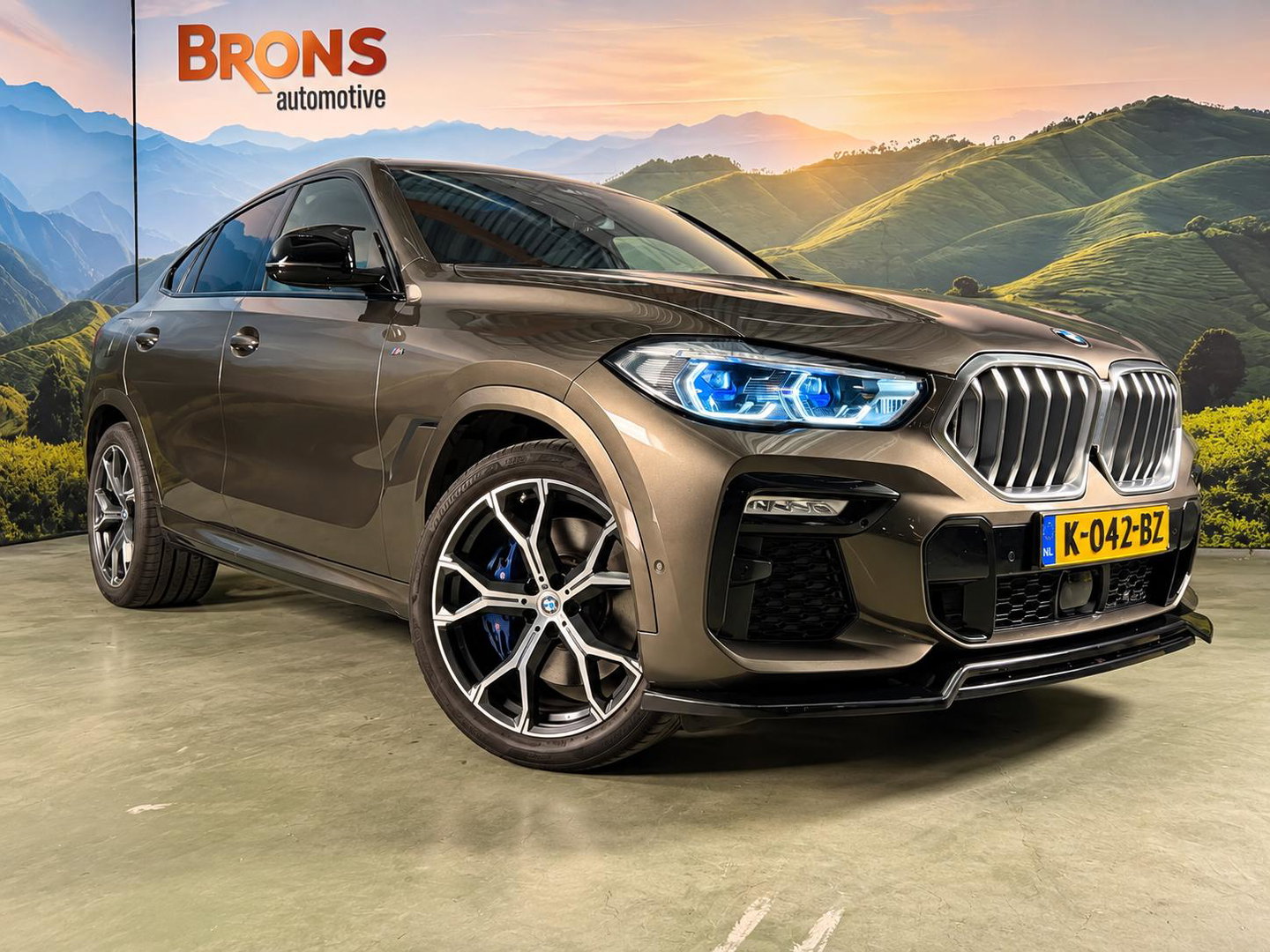 BMW X6 xDrive40i High Executive Sky Lounge l M-pakket l Scherm achterin