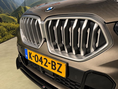 BMW X6 xDrive40i High Executive Sky Lounge l M-pakket l Scherm achterin