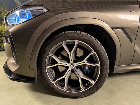 BMW X6 xDrive40i High Executive Sky Lounge l M-pakket l Scherm achterin