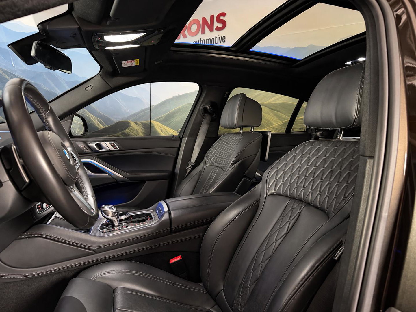 BMW X6 xDrive40i High Executive Sky Lounge l M-pakket l Scherm achterin