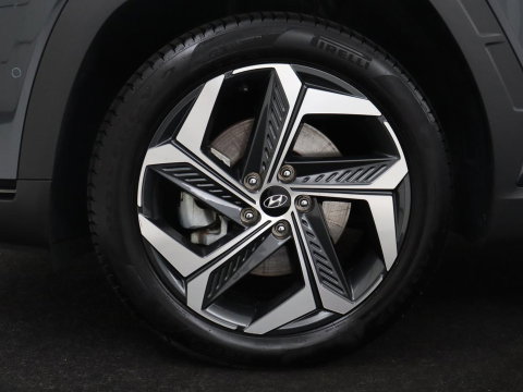 Hyundai Tucson 1.6 T-GDI HEV Premium | Leder | Stoelkoeling | Trekhaak | 360 camera | Adaptive cruise | Carplay | Krell Sound | Memory | Stuur/stoelverwarming |