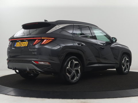 Hyundai Tucson 1.6 T-GDI HEV Premium | Leder | Stoelkoeling | Trekhaak | 360 camera | Adaptive cruise | Carplay | Krell Sound | Memory | Stuur/stoelverwarming |