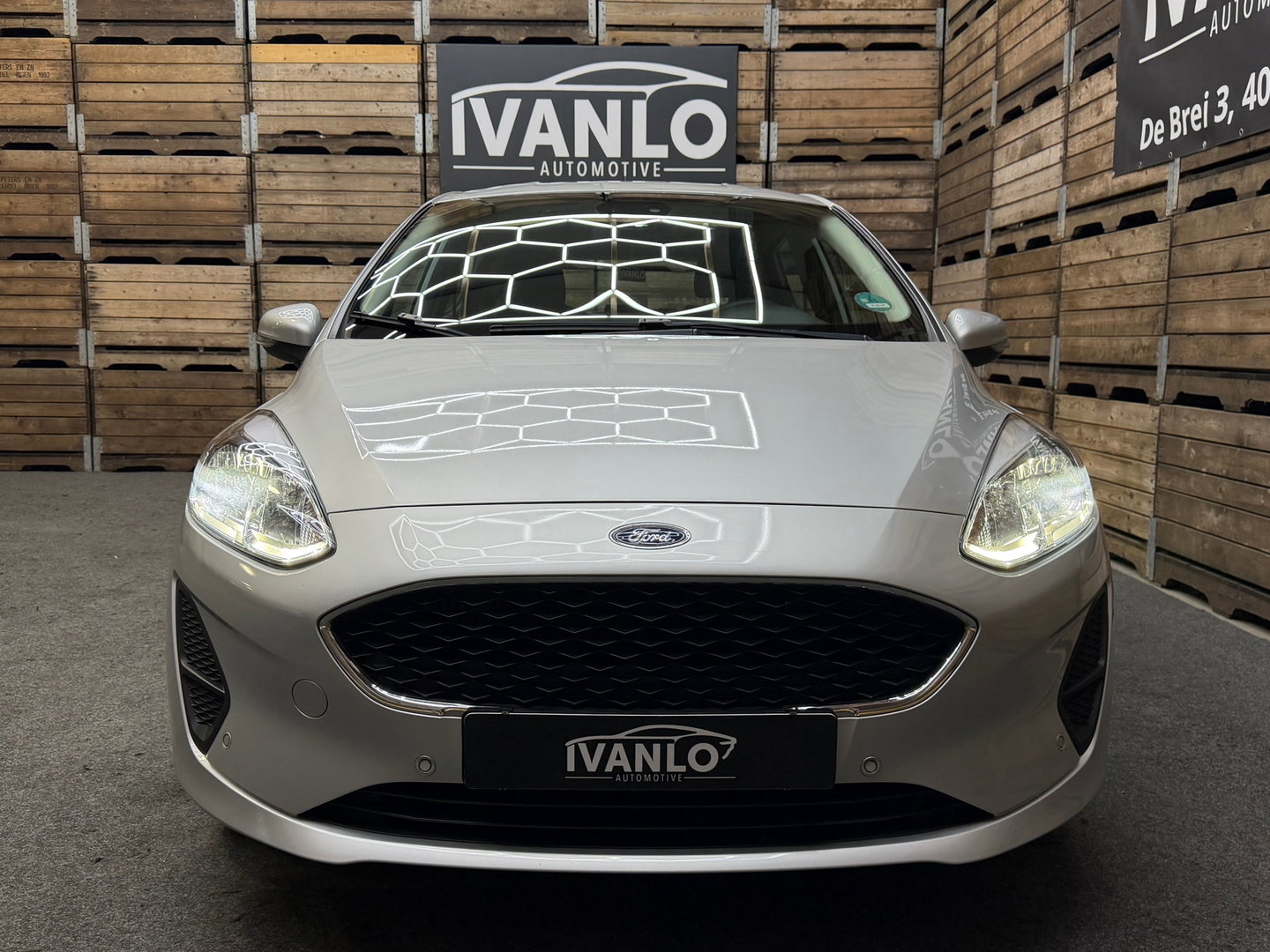 Ford Fiesta 1.0 EcoBoost Titanium Navigatie, Cruise control, 4 seizoenen banden