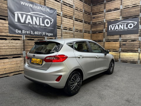 Ford Fiesta 1.0 EcoBoost Titanium Navigatie, Cruise control, 4 seizoenen banden