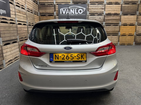 Ford Fiesta 1.0 EcoBoost Titanium Navigatie, Cruise control, 4 seizoenen banden