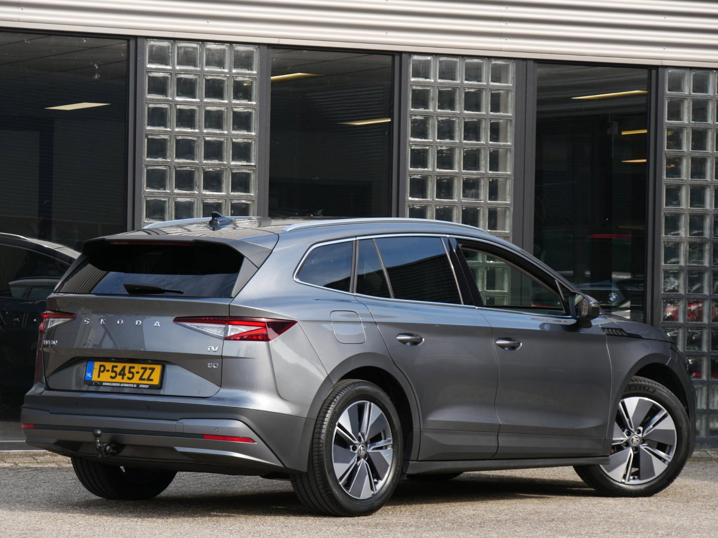 Škoda Enyaq iV 80/ WARMTEPOMP/ LEER/ ADAPTIVE/ TREKHAAK/ HEAD-UP/ SIDE ASSIST/ SOH 95%