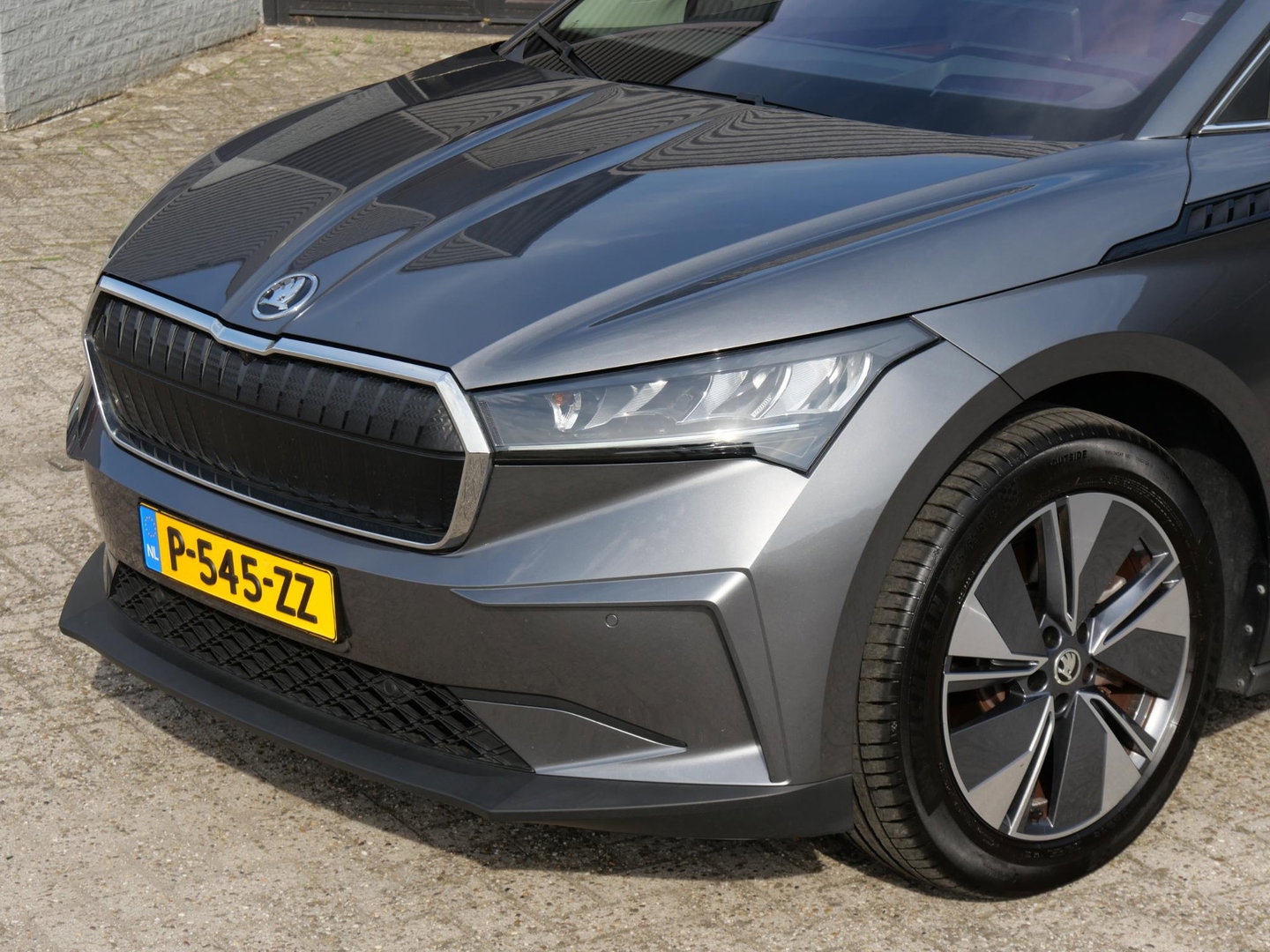 Škoda Enyaq iV 80/ WARMTEPOMP/ LEER/ ADAPTIVE/ TREKHAAK/ HEAD-UP/ SIDE ASSIST/ SOH 95%