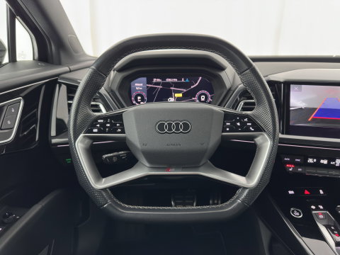 Audi Q4 e-tron 40 S edition 77 kWh (3-Fase-11kW) (INCL.BTW) *HEAT-PUMP | LEATHER-FABRIC | MATRIX-LED | ADAPTIVE-CRUISE | CAMERA | DIGI-COCKPIT | KEYLESS | AMBIENT-LIGHT | AUDI-SOUND | NAVI-FULLMAP | PRIVACY-GLASS | ECC | PDC | 20''ALU*
