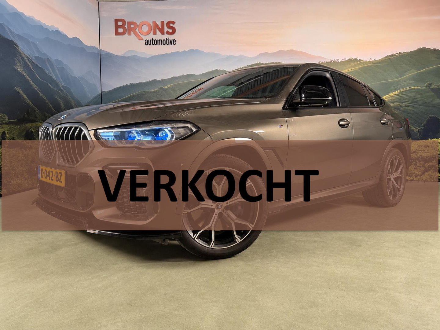 BMW X6 xDrive40i High Executive Sky Lounge l M-pakket l Scherm achterin