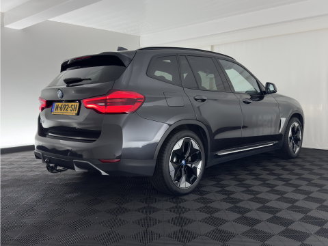 BMW iX3 High Executive 80 kWh [3-Fase-11kW] {SoH-100%} (INCL-BTW) Aut. *PANO | LEATHER | HARMAN/KARDON | ADAPTIVE-CRUISE | FULL-LED | BLINDSPOT | MEMORY-PACK | DIGI-COCKPIT | HEATED-SPORTSEATS | KEYLESS | CAMERA | DAB+ | TOWBAR | HEAD-UP | 20''AL